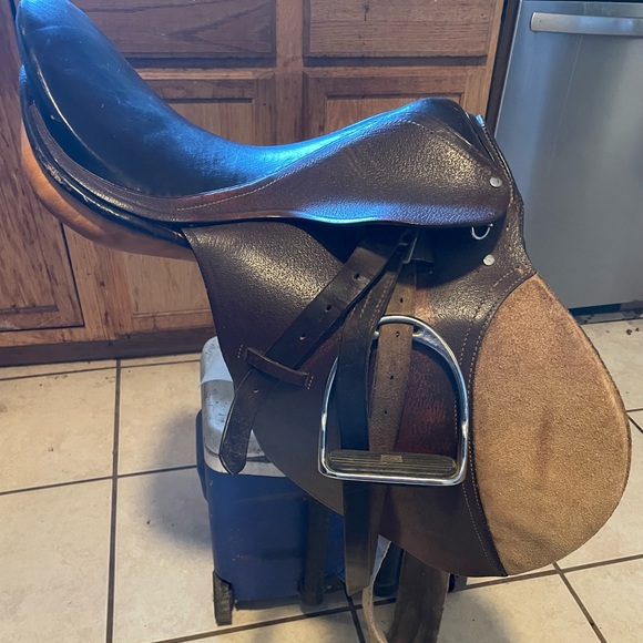 Lexington Other - English Saddle with stirrups and fabric girth.  Schooling training saddle. 17 in